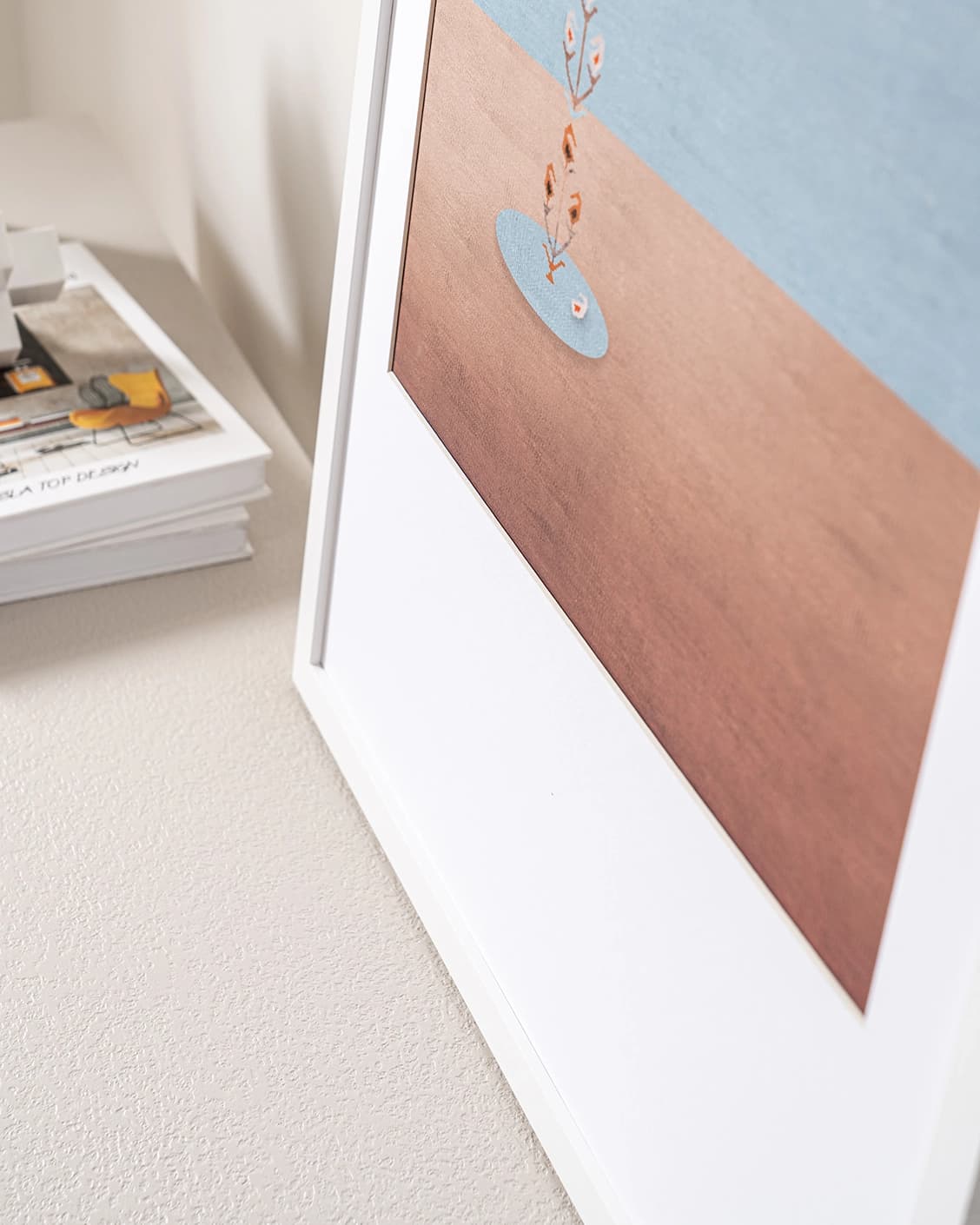 Lone Tree fine art print in blue and beige, shown in a lifestyle close-up view as image 6