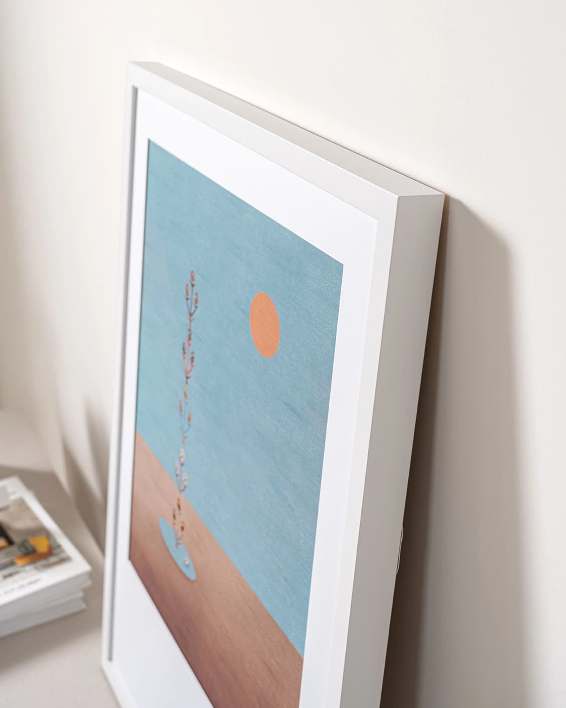 Lone Tree fine art print in blue and beige, shown in a lifestyle top view as image 5