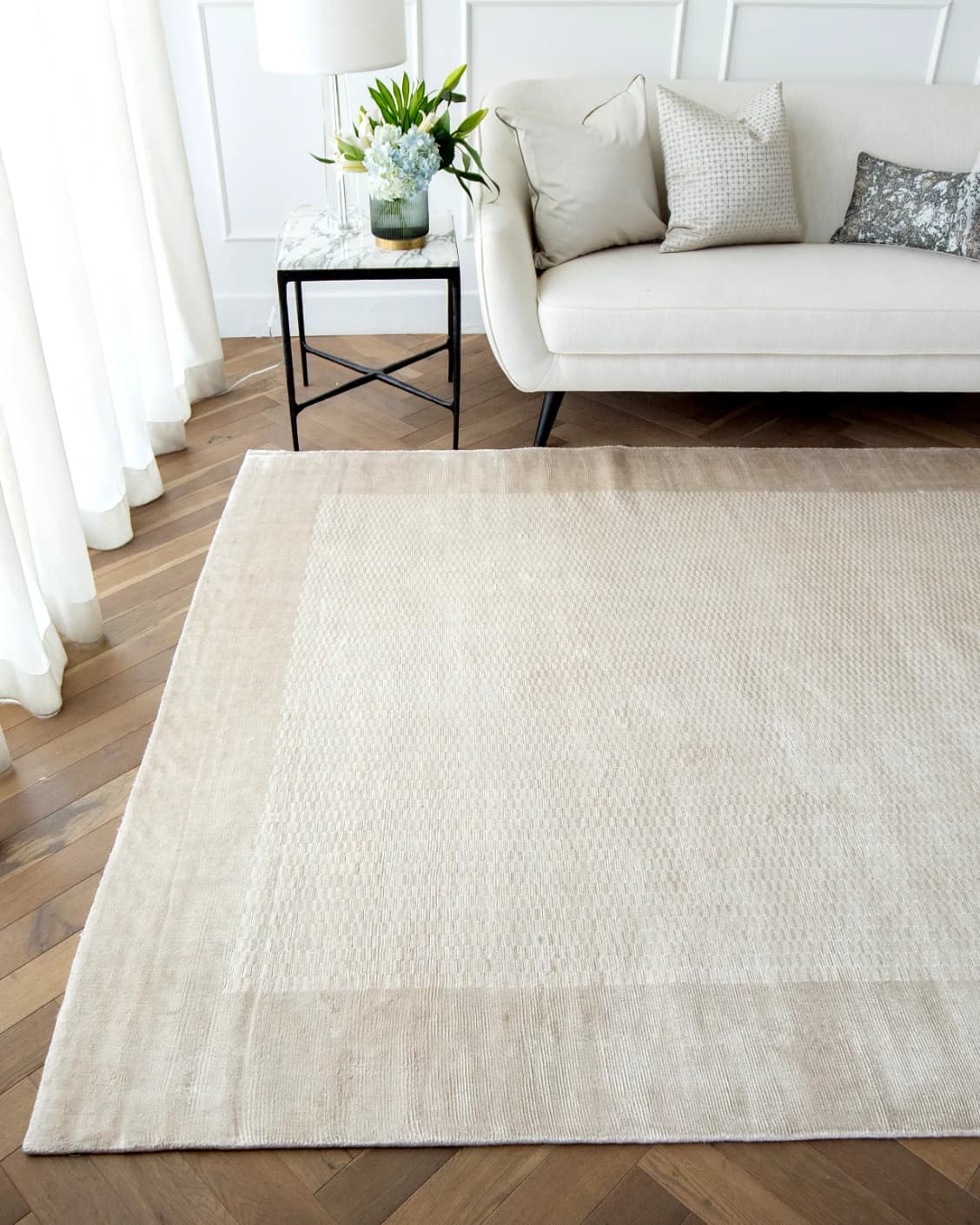 Luna Clay carpet in beige, shown in a lifestyle front view as image 4