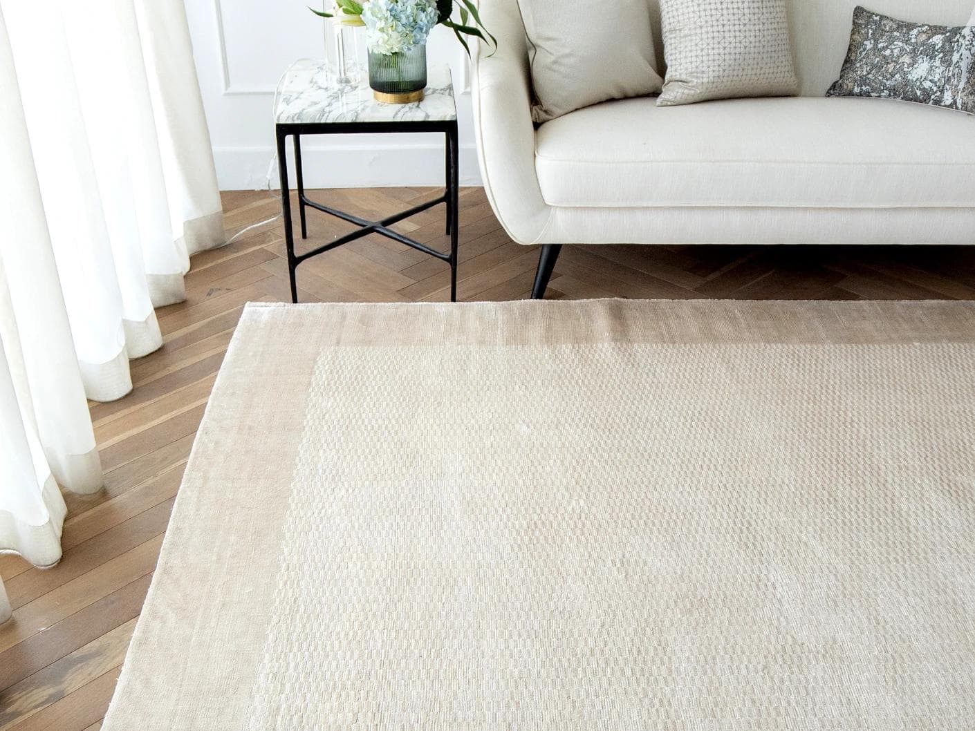 Luna Clay carpet in beige, shown in a lifestyle front view as image 4