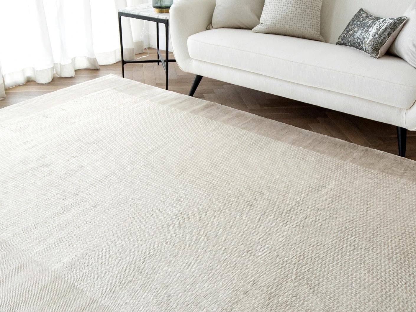 Luna Clay carpet in beige, shown in a lifestyle right view as image 5