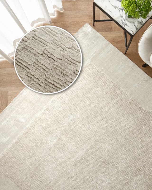 Luna Clay carpet in beige, shown in a lifestyle top view as image 2