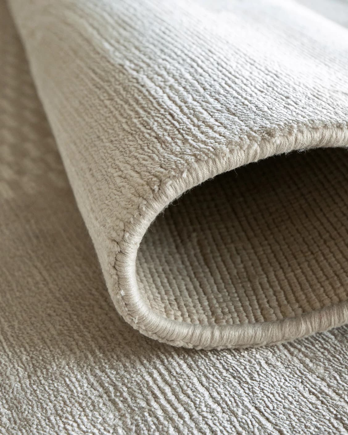Luna Clay carpet in beige, shown in a product close-up as image 7