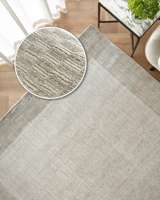 Luna Dune carpet in taupe, brown and beige, shown in a lifestyle top view as image 2