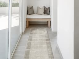 Luna Dune Runners carpet in taupe, brown and beige, shown in a lifestyle front view