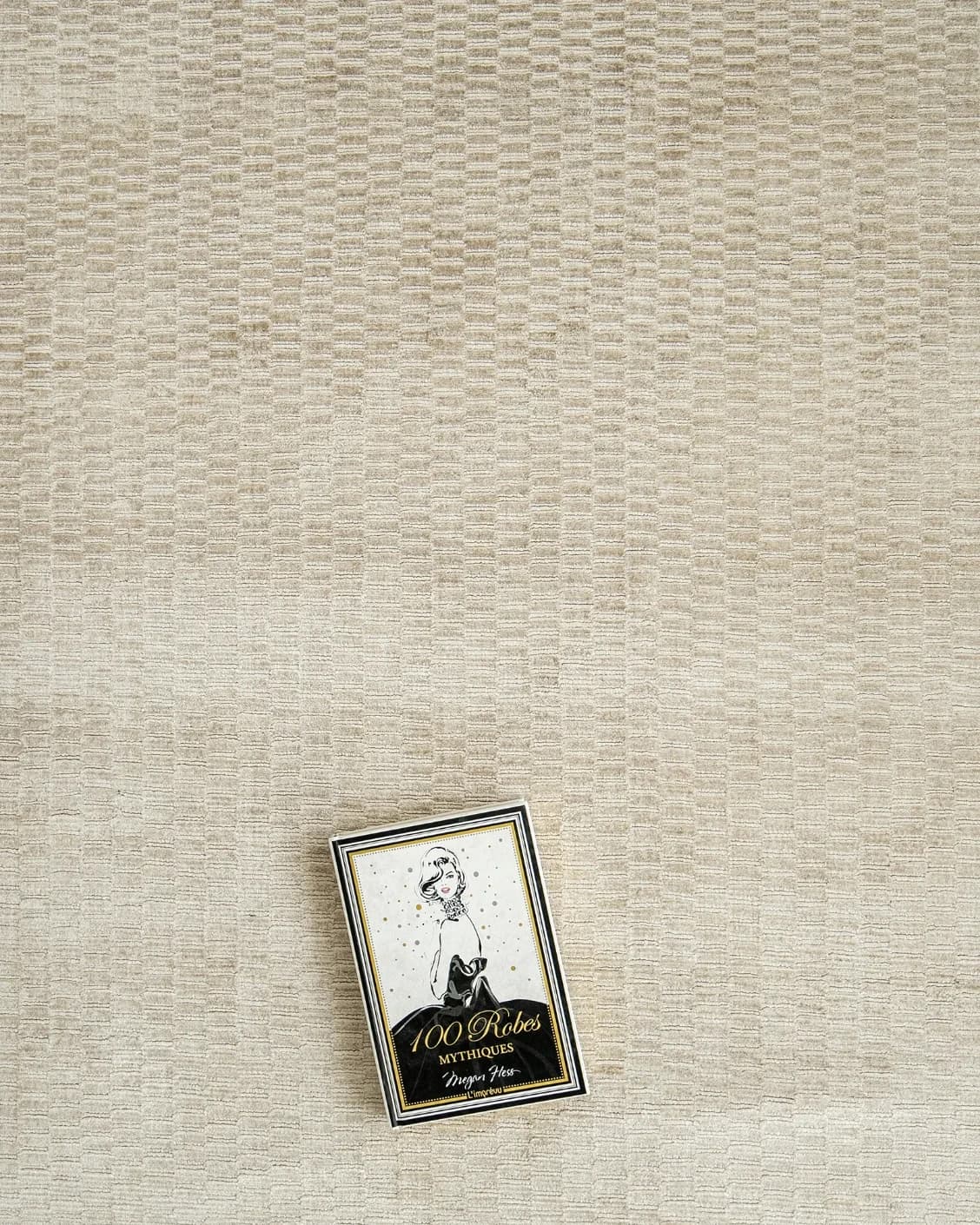 Luna Sandy carpet in beige, shown in a lifestyle top view as image 9