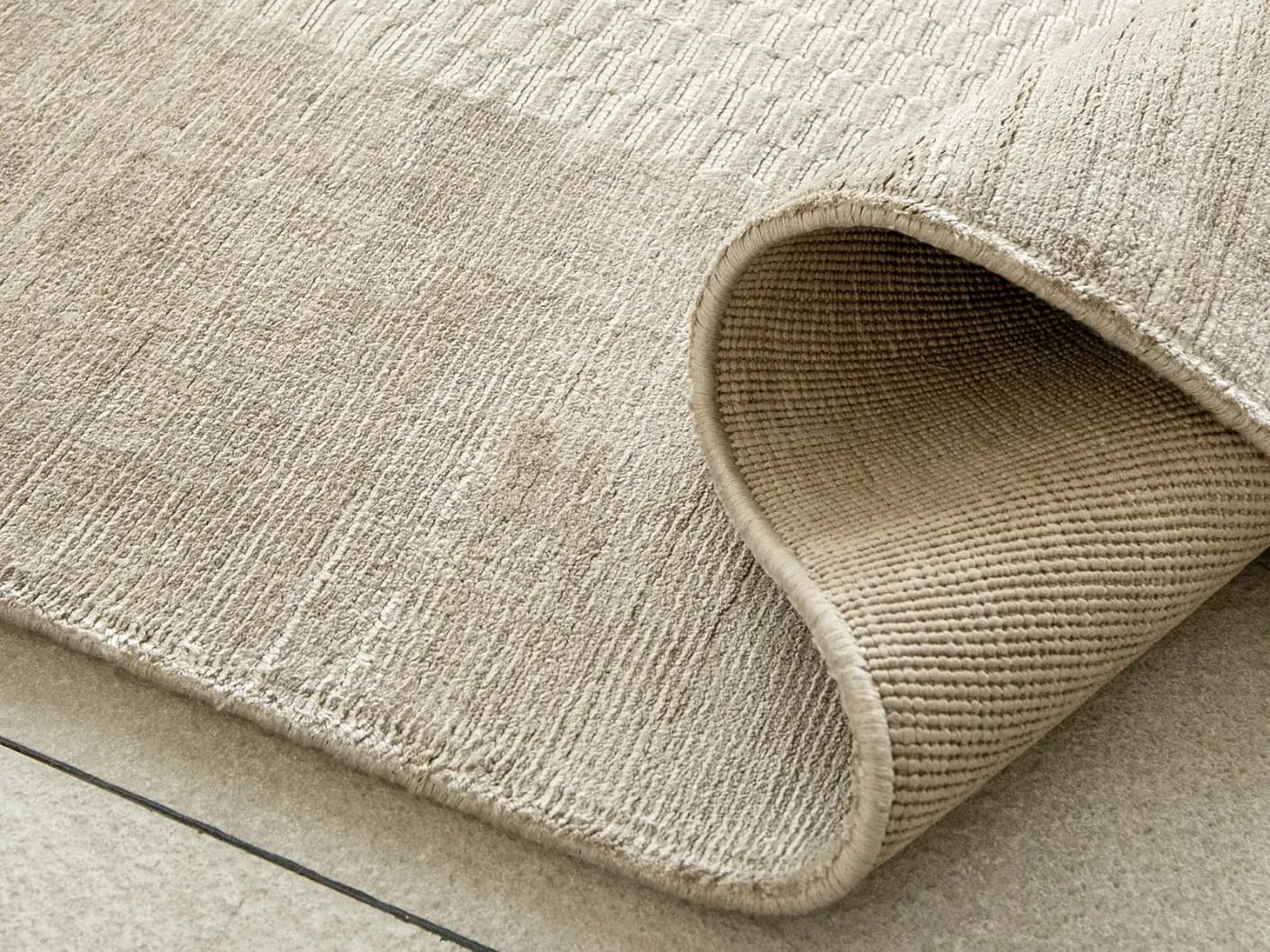Luna Sandy carpets in sandy and beige, shown in a product close-up view