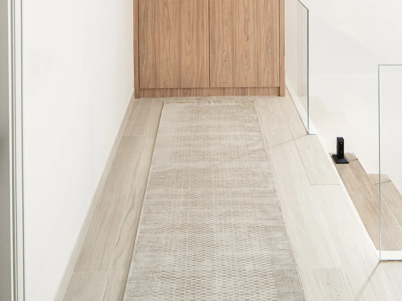 Luna Sandy Runners carpet in beige, shown in a lifestyle front view