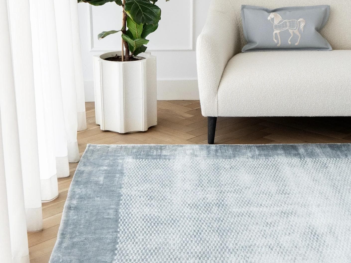 Luna Sky carpets in blue, shown in a lifestyle front view as image 2