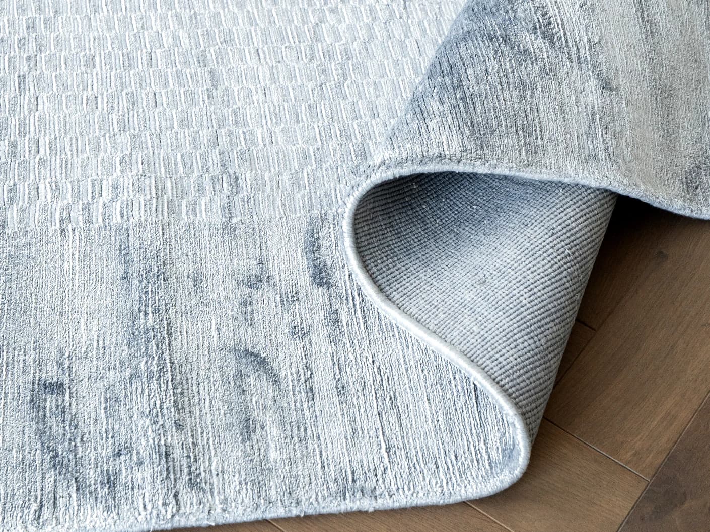 Luna Sky carpets in sky and blue, shown in a product close-up view