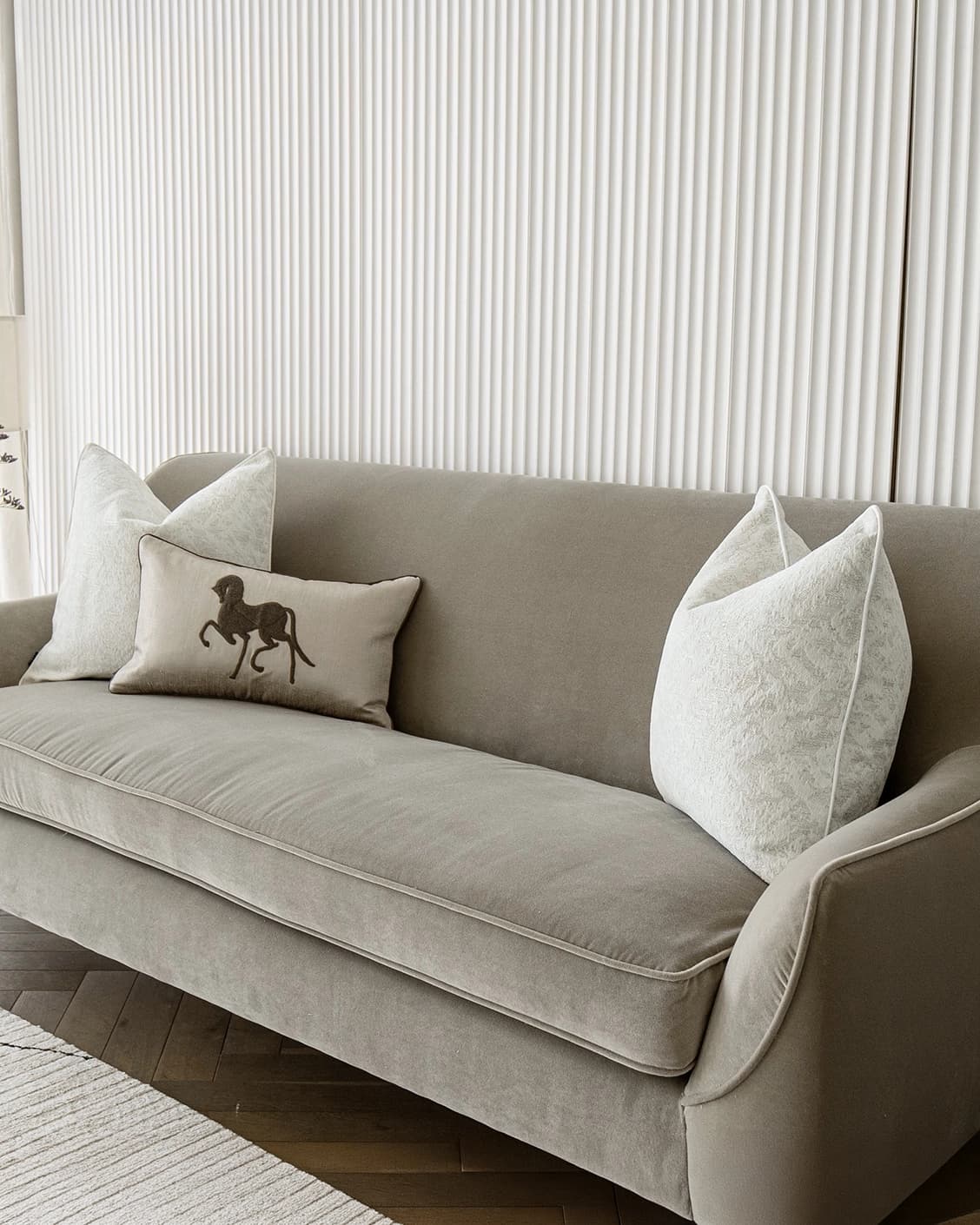 Luther Bundle cushion in white, brown and beige, shown in a lifestyle right view as image 2