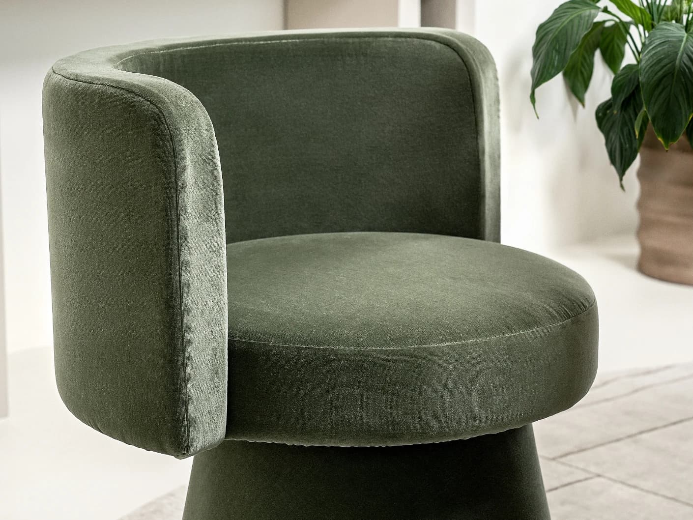 Mara Accent Swivel Chair in forest green, shown in a lifestyle left view as image 4