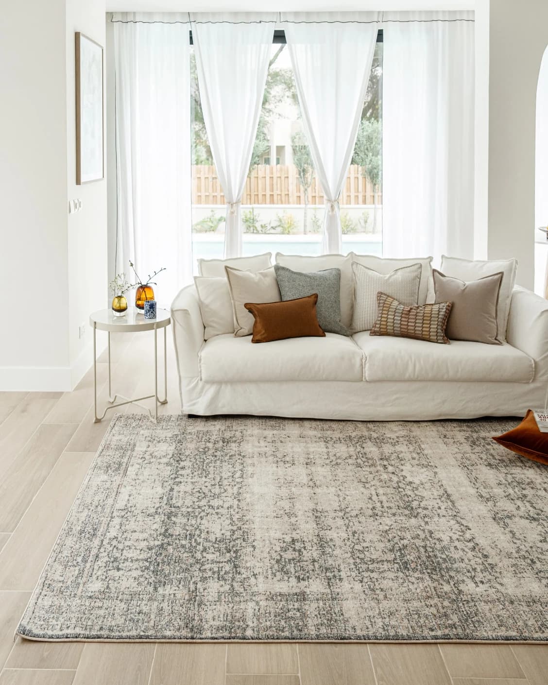 Marco Azure carpet in cream, grey and beige, shown in a lifestyle front view as image 4