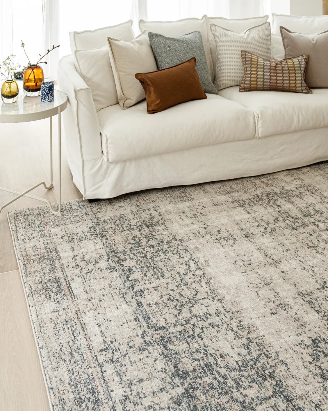 Marco Azure carpet in cream, grey and beige, shown in a lifestyle left view as image 6