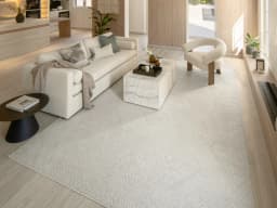 Marco Sandy carpet in sandy and beige, shown in a lifestyle front view