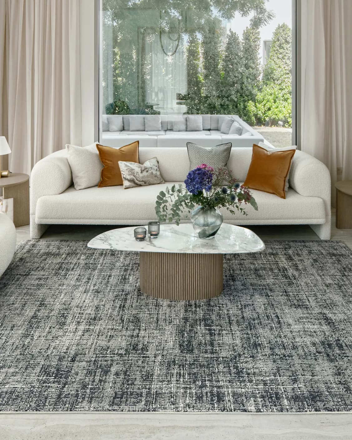 Marco Sky carpet in sky and blue, shown in a lifestyle front view as image 4
