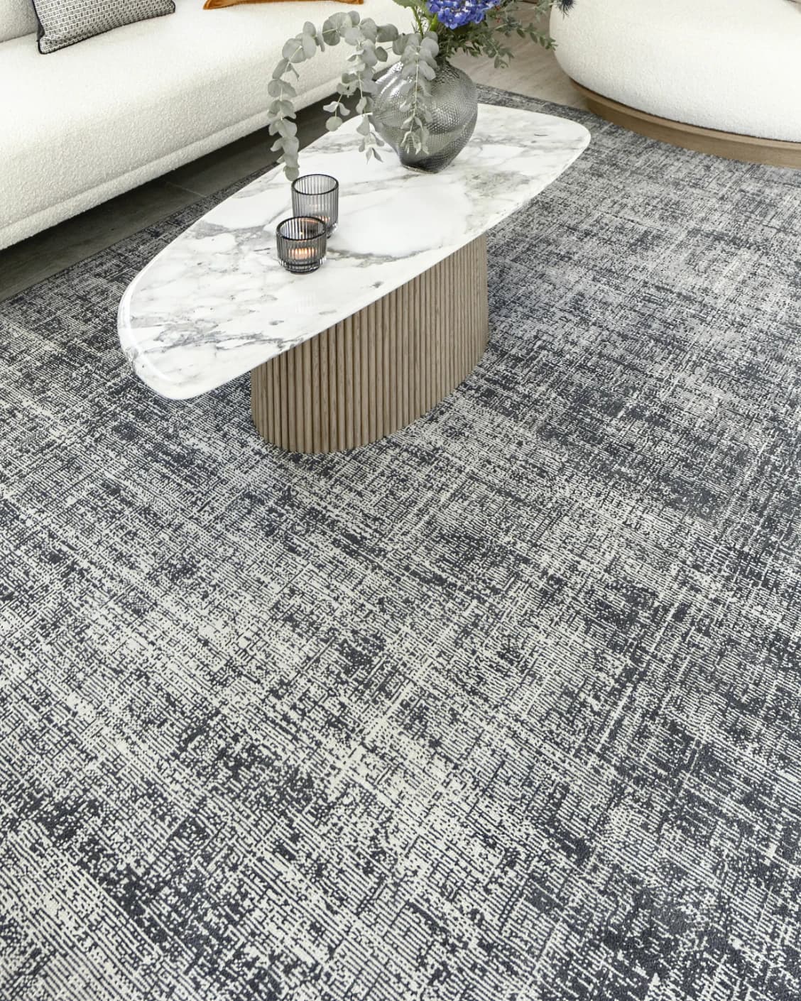 Marco Sky carpet in sky and blue, shown in a lifestyle left view as image 6