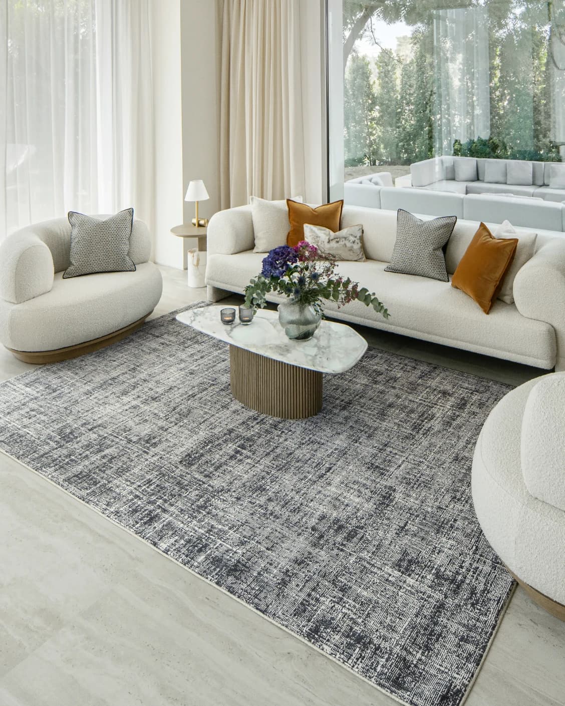 Marco Sky carpet in sky and blue, shown in a lifestyle right view as image 7