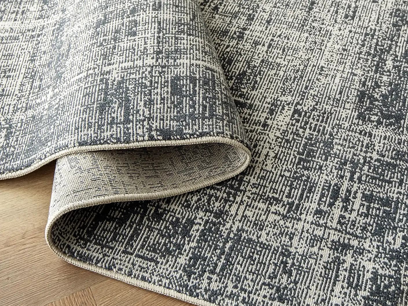 Marco Sky carpets in sky and blue, shown in a product close-up top view