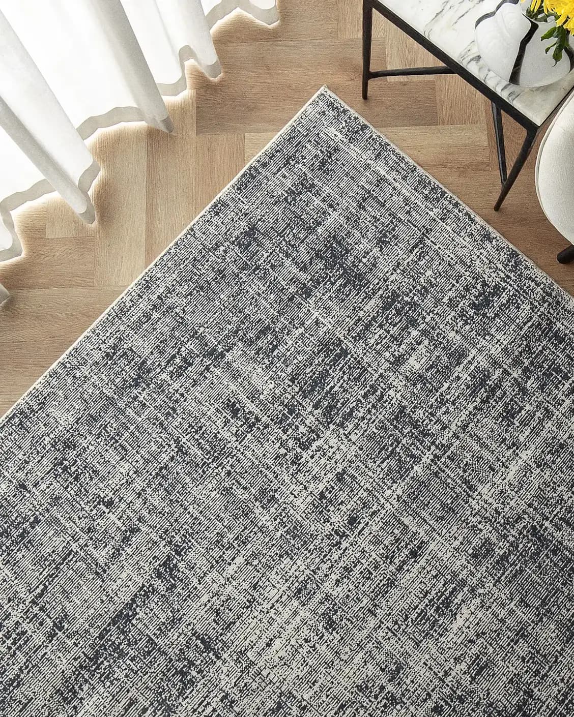 Marco Sky carpet in sky and blue, shown in a lifestyle top view as image 2