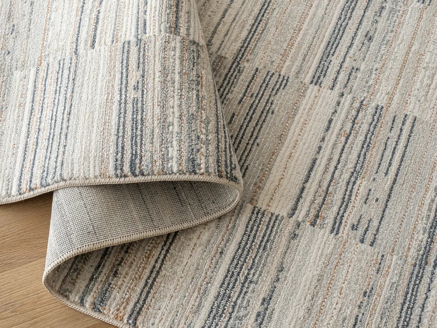 Marco Stone carpets in stone, beige and grey, shown in a product close-up view