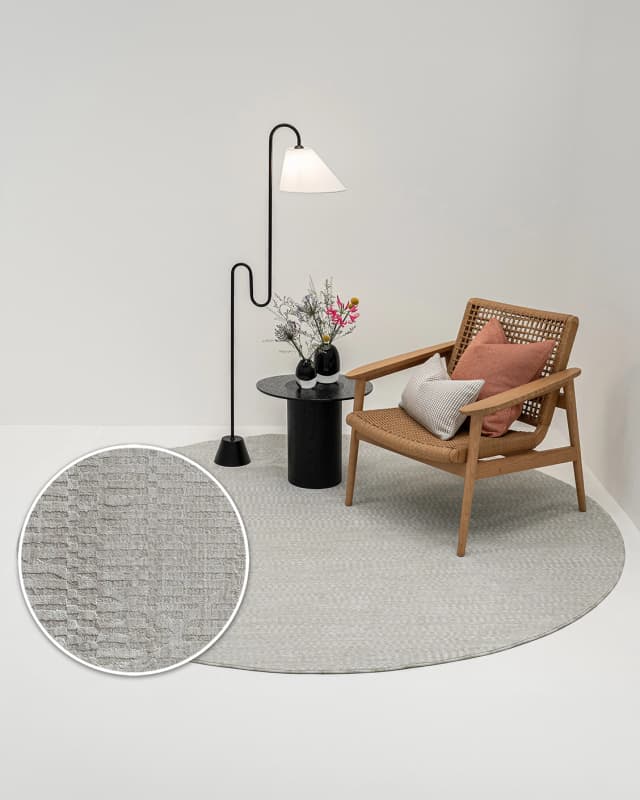 Maverick Sandy Round carpet in sandy and beige, shown in a lifestyle top view as image 2