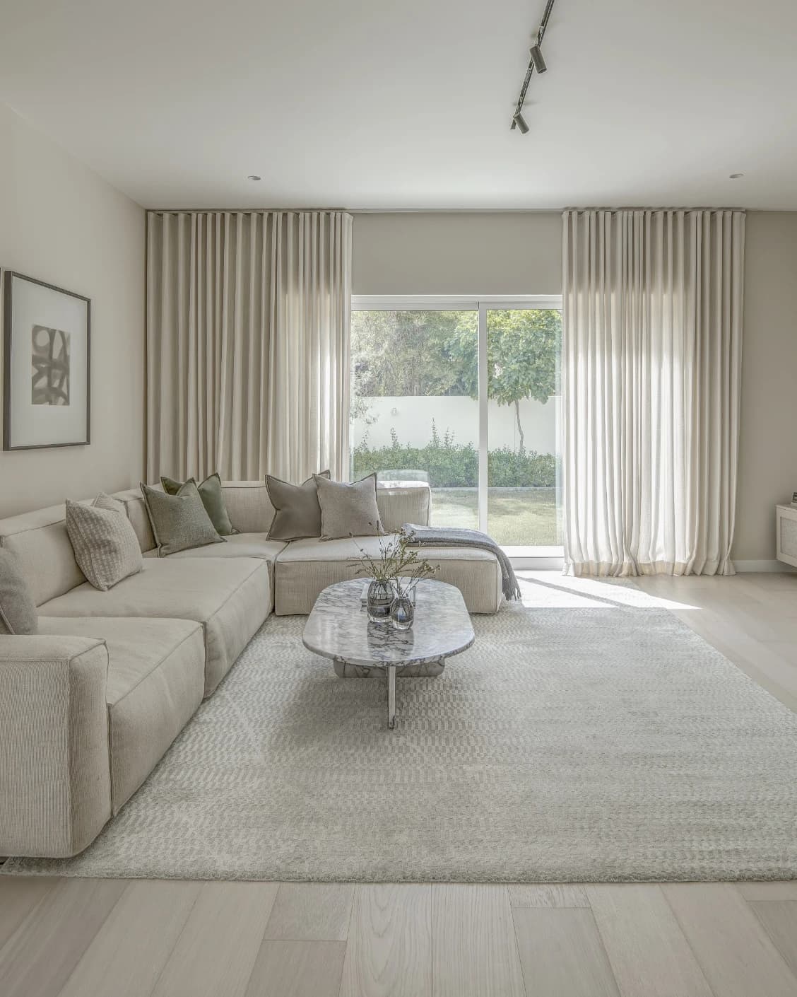 Maverick Sandy carpet in beige, shown in a lifestyle front view as image 5