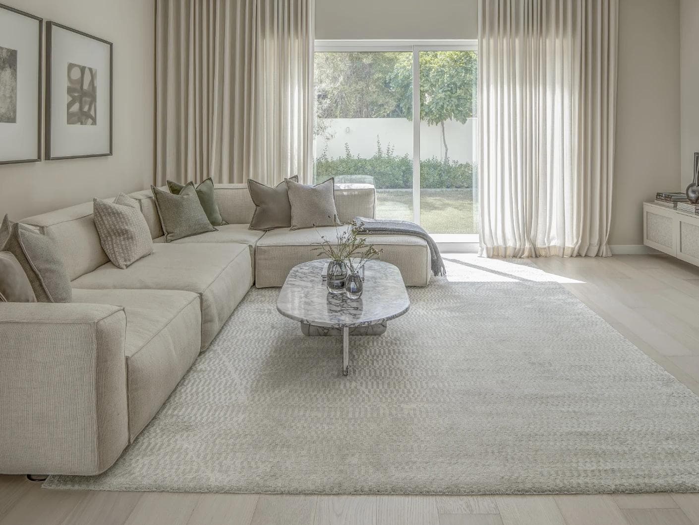 Maverick Sandy carpet in beige, shown in a lifestyle front view as image 5