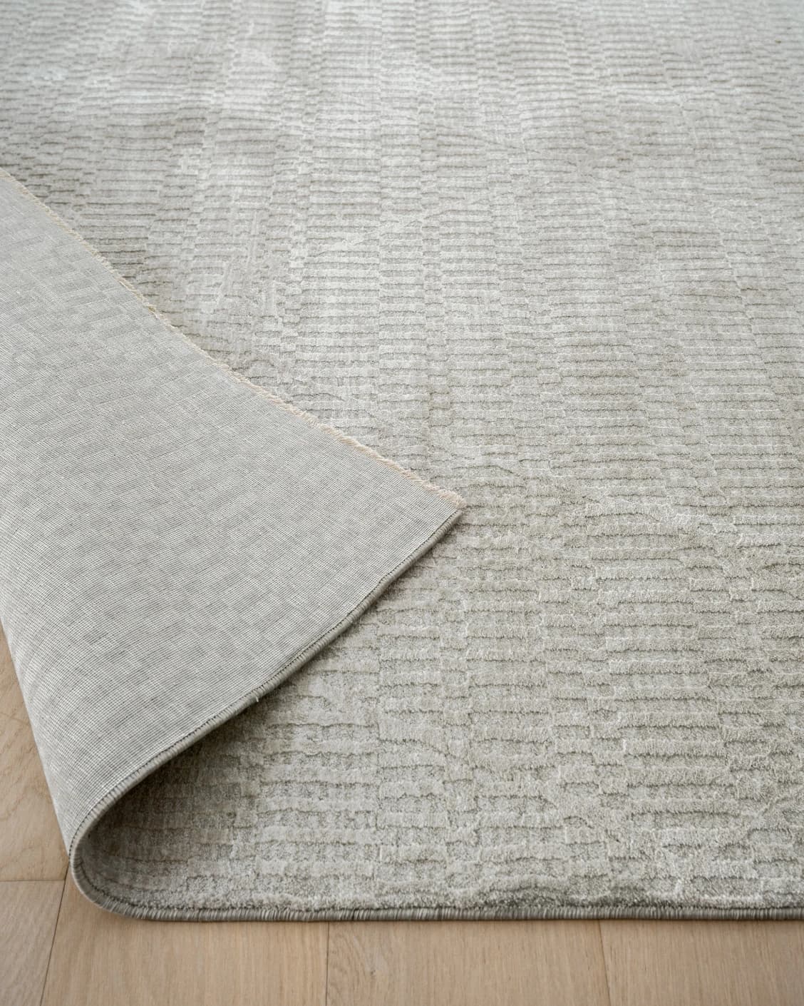 Maverick Sandy carpet in beige, shown in a product close-up as image 7