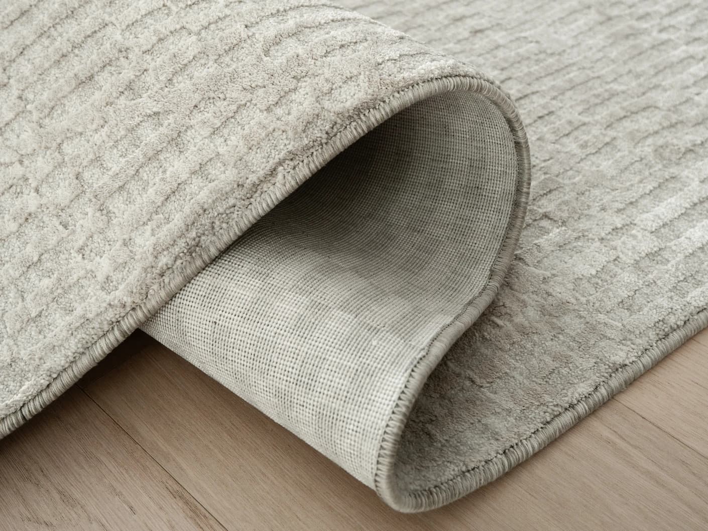 Maverick Sandy carpets in sandy and beige, shown in a product close-up view