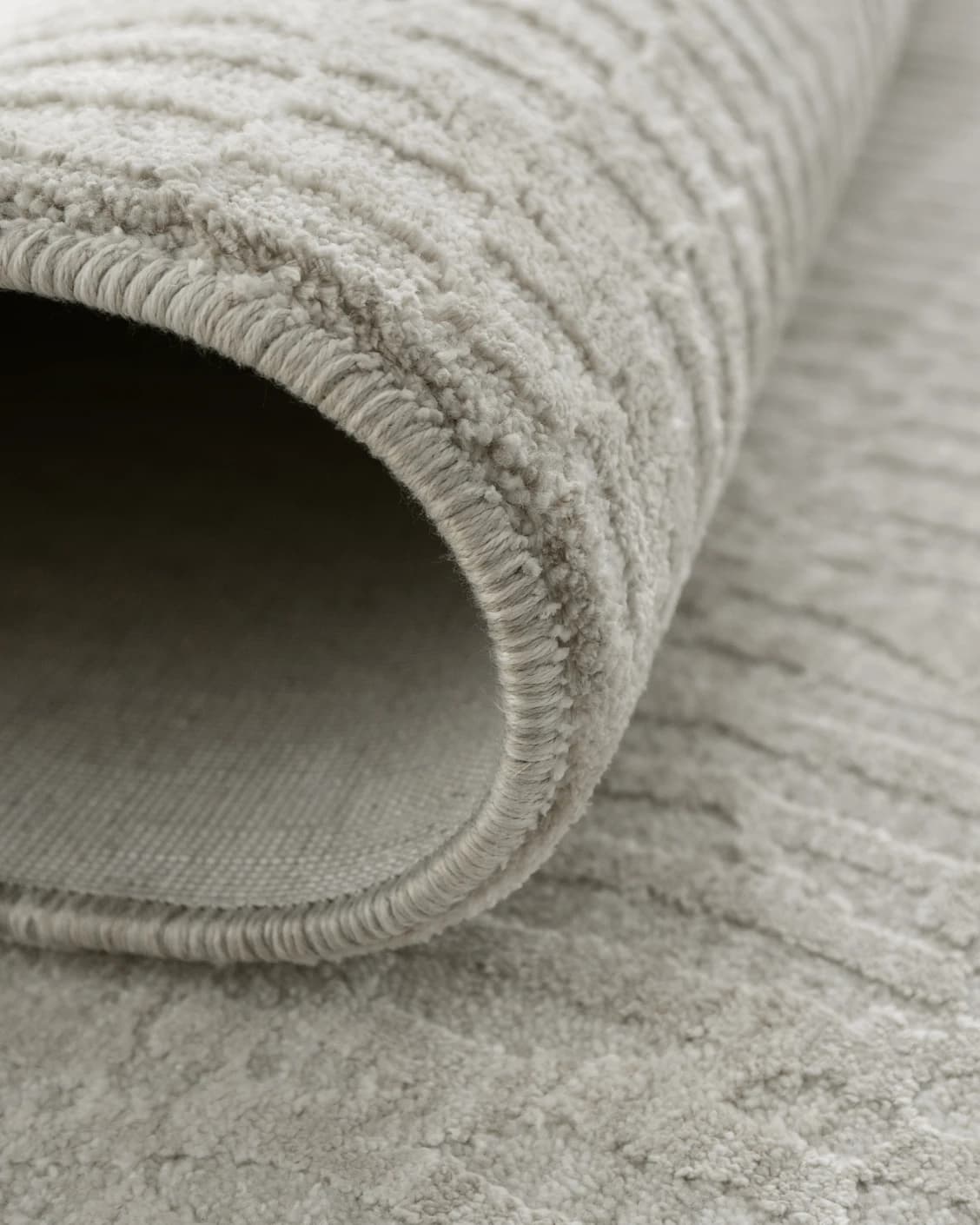 Maverick Sandy carpet in beige, shown in a product close-up as image 9