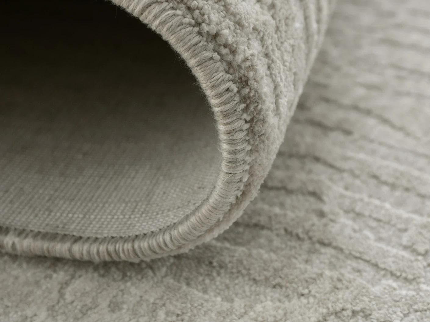 Maverick Sandy carpet in beige, shown in a product close-up as image 9