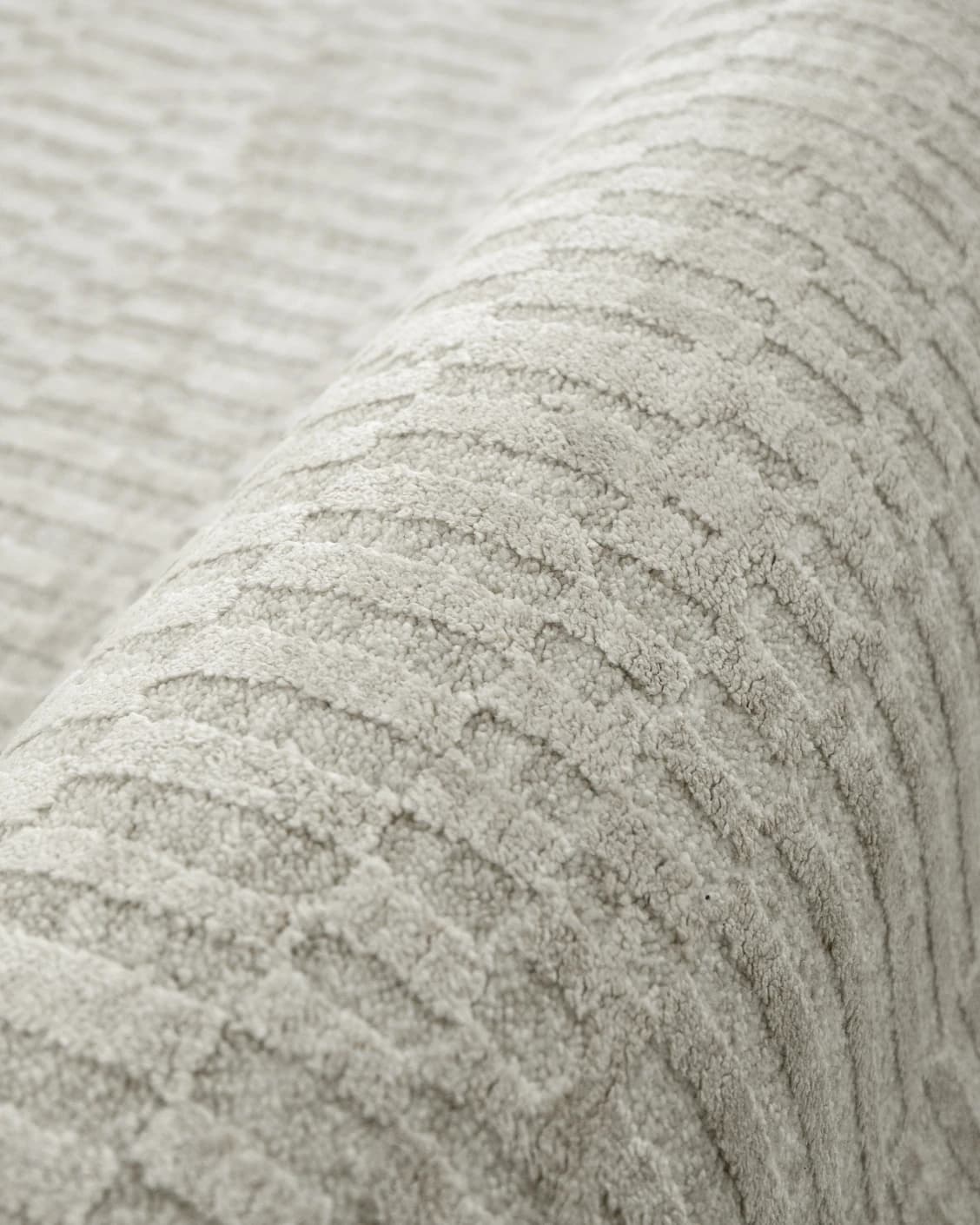 Maverick Sandy carpet in beige, shown in a product close-up as image 10