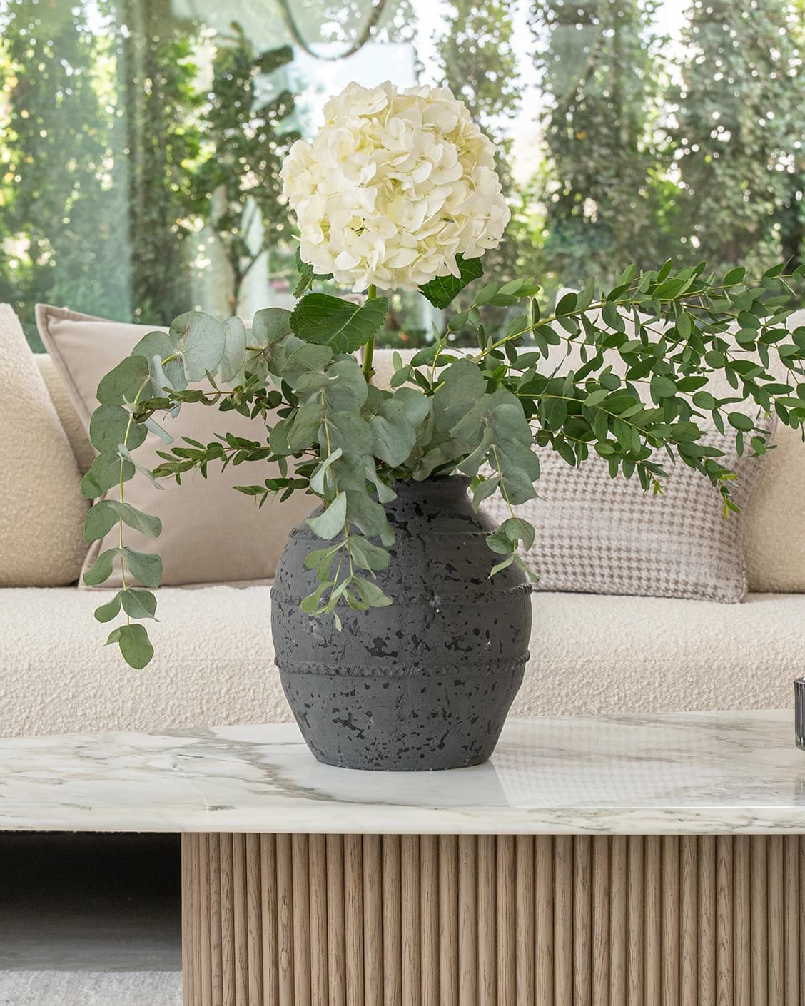 Maxwell Arneson vases in grey, shown in a lifestyle front view as image 2