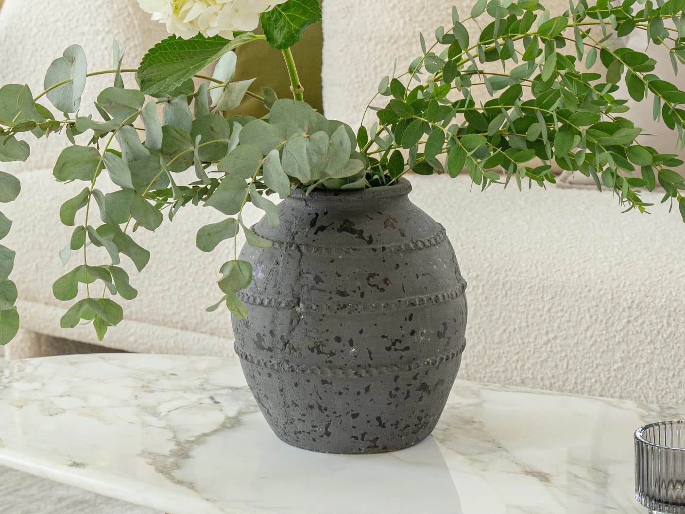 Maxwell Arneson vases in grey, shown in a lifestyle right view