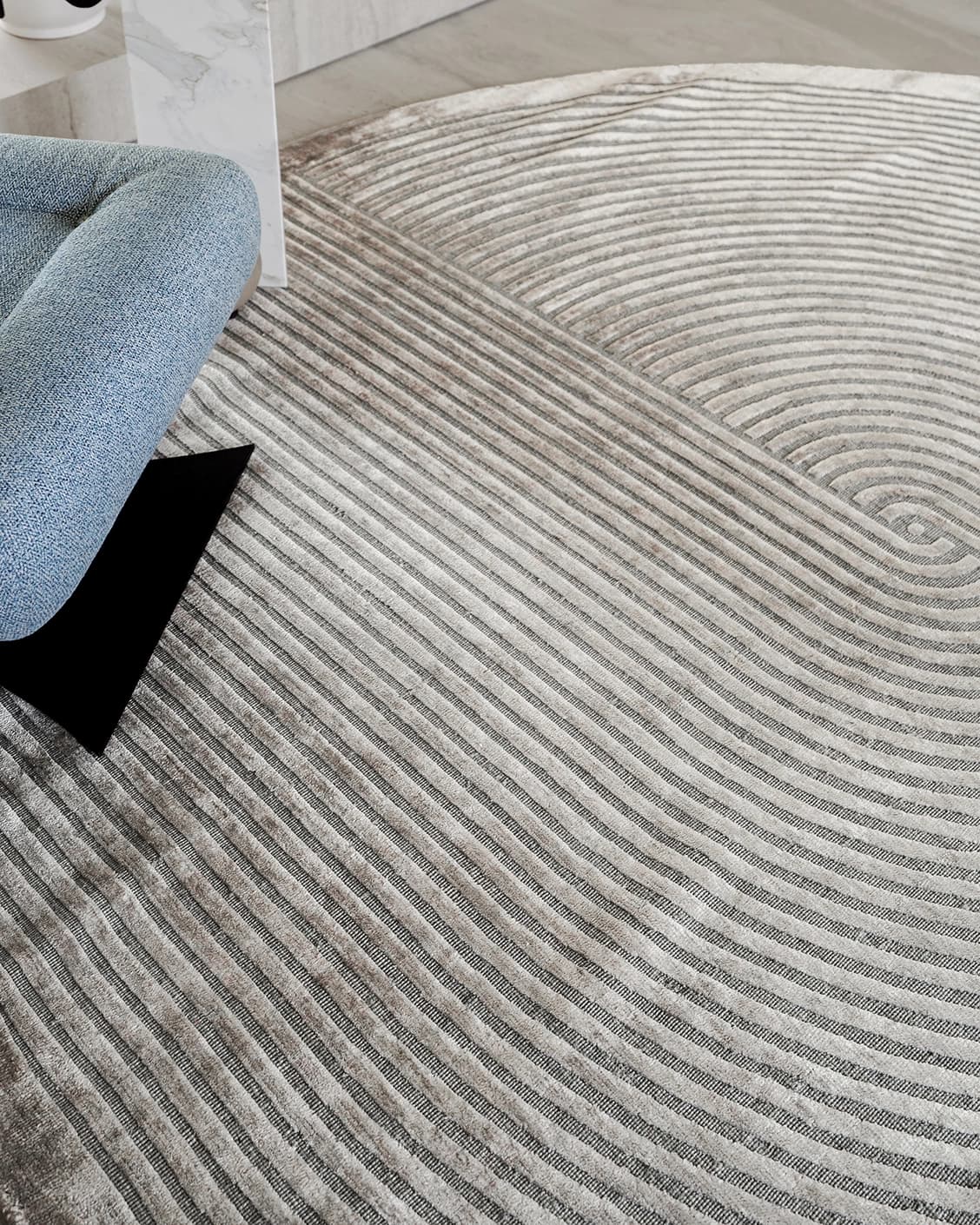 Maze Ashton carpets in grey, shown in a lifestyle close-up top view as image 1