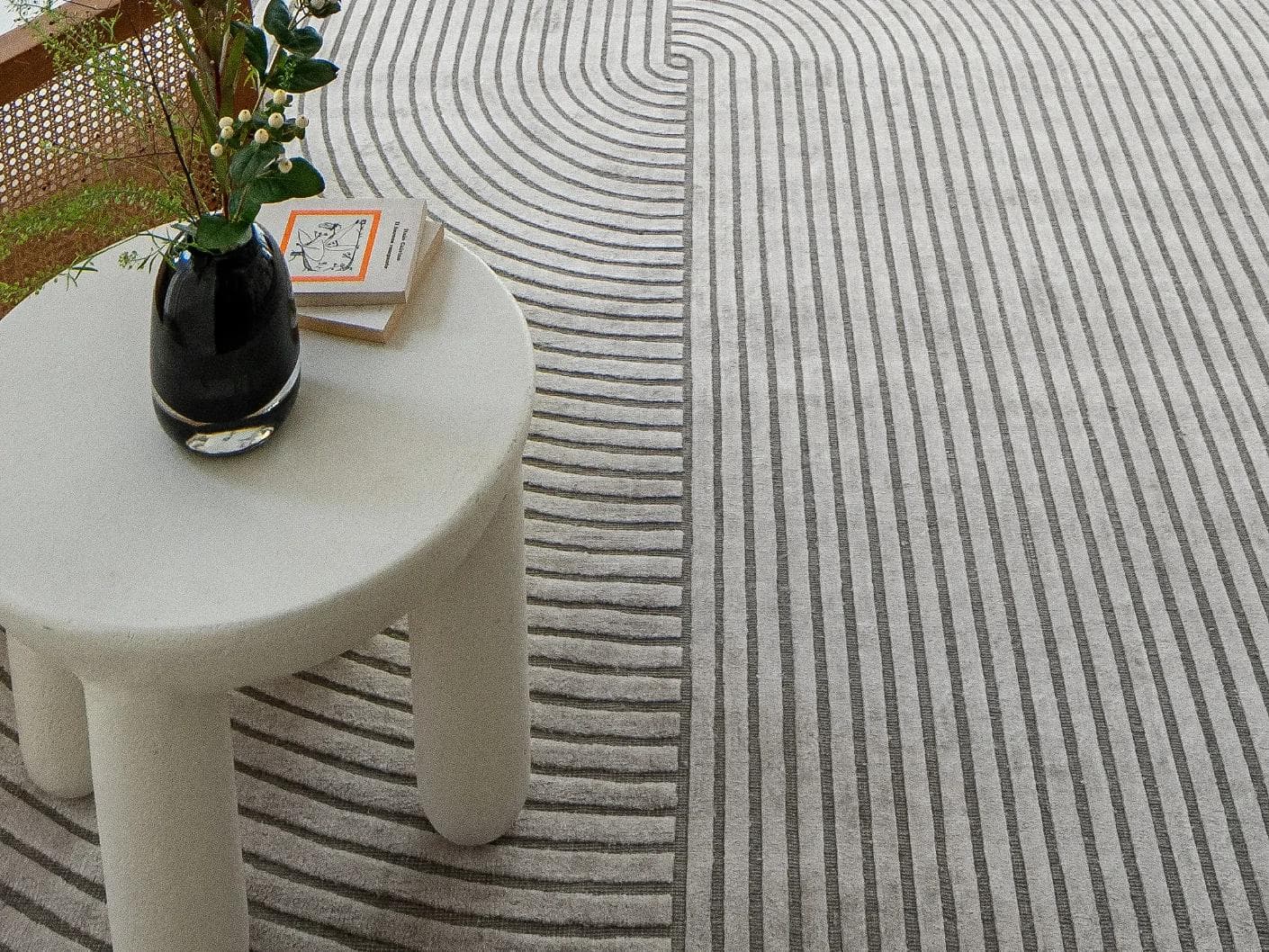 Maze Ashton carpet in grey, shown in a lifestyle close-up as image 4