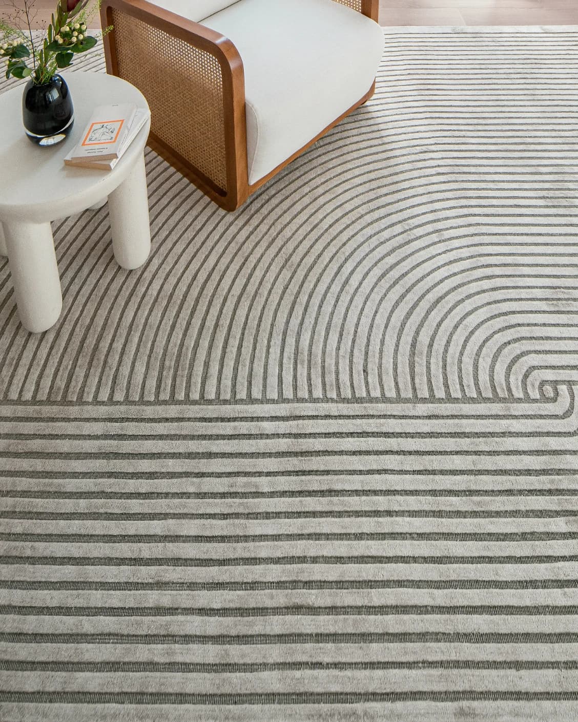 Maze Ashton carpet in grey, shown in a lifestyle top view as image 7