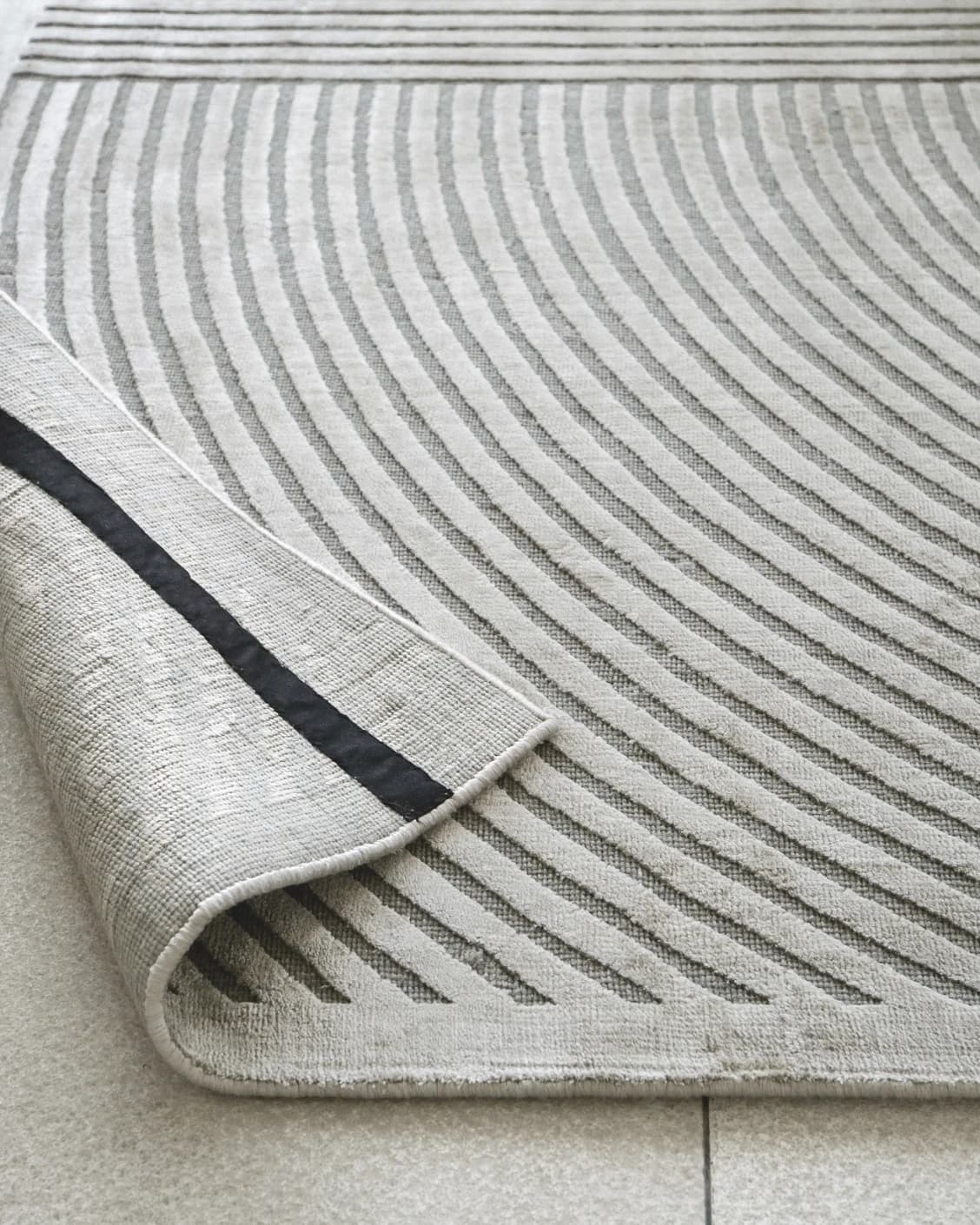 Maze Ashton carpet in grey, shown in a product close-up as image 9