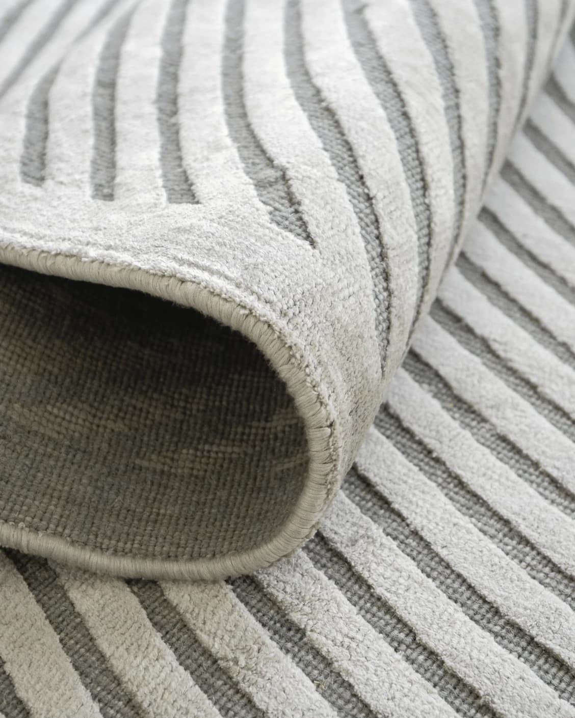 Maze Ashton carpet in grey, shown in a product close-up as image 11