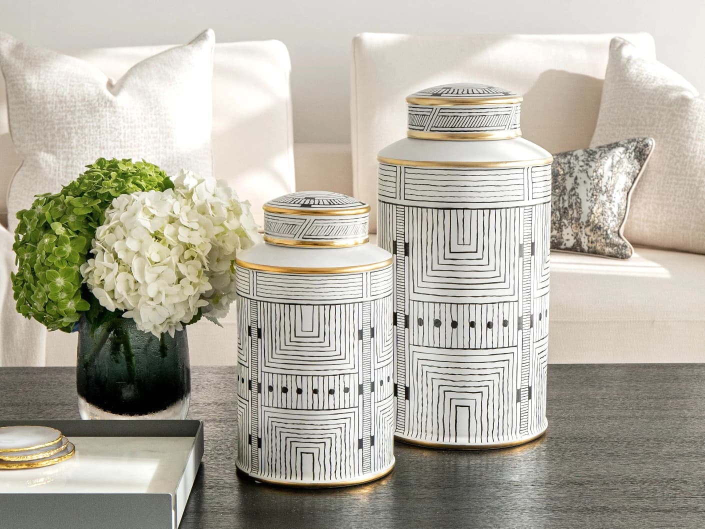 Maze Bundle canisters in black and white, shown in a lifestyle front view