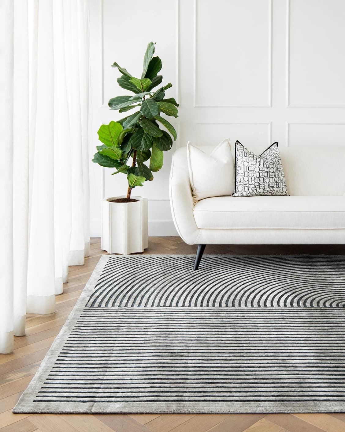 Maze Ebony carpet in grey and charcoal, shown in a lifestyle front view as image 4