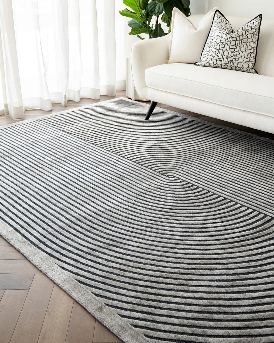 Maze Ebony carpet in grey and charcoal, shown in a lifestyle right view as image 5