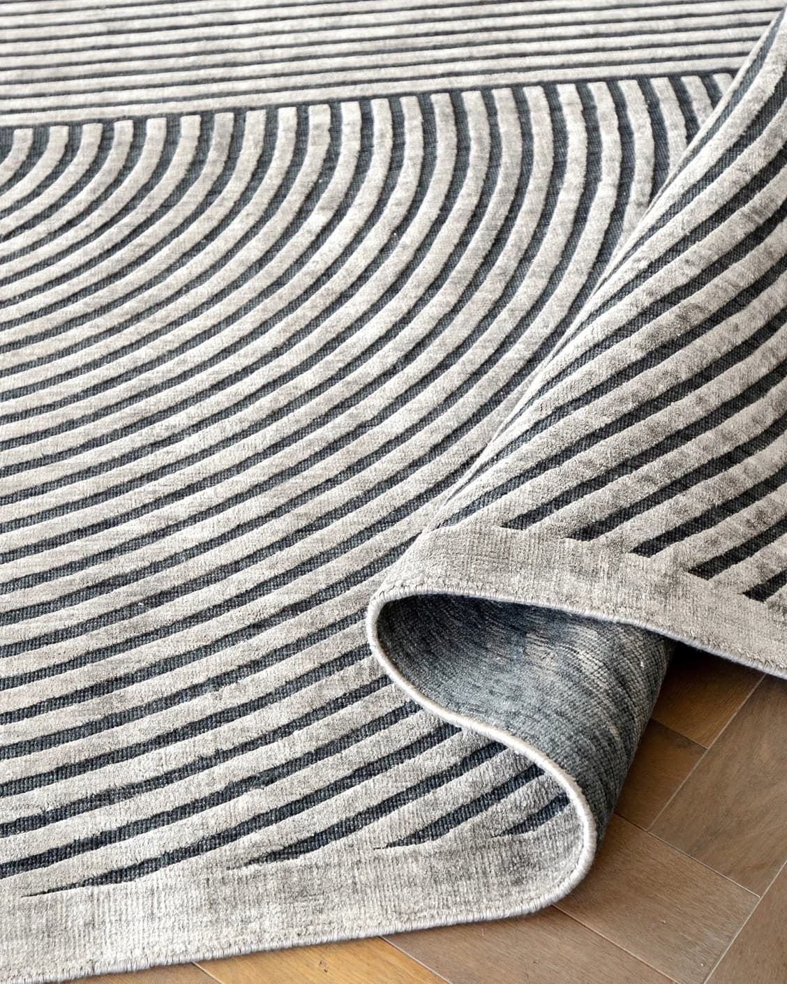 Maze Ebony carpet in grey and charcoal, shown in a product close-up as image 9