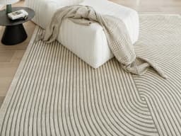 Maze Sandy carpet in sandy and beige, shown in a lifestyle front view