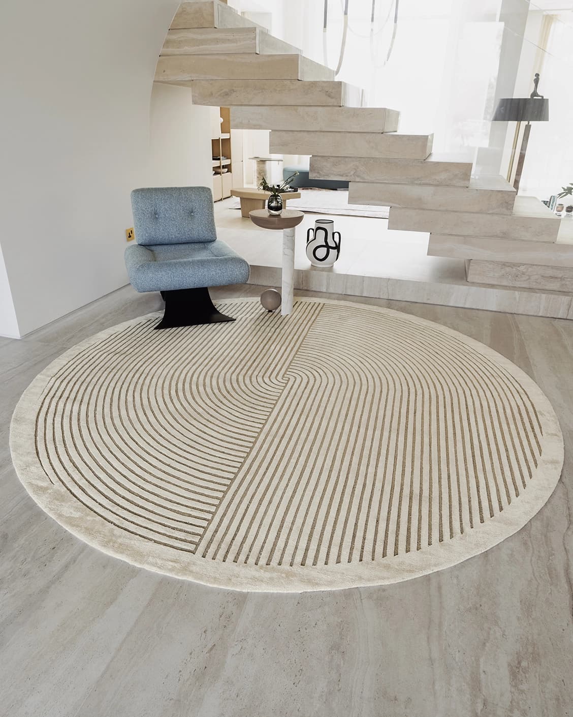 Maze Sandy Round carpet in sandy and beige, shown in a lifestyle front view as image 2