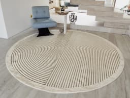 Maze Sandy Round carpet in sandy and beige, shown in a lifestyle front view