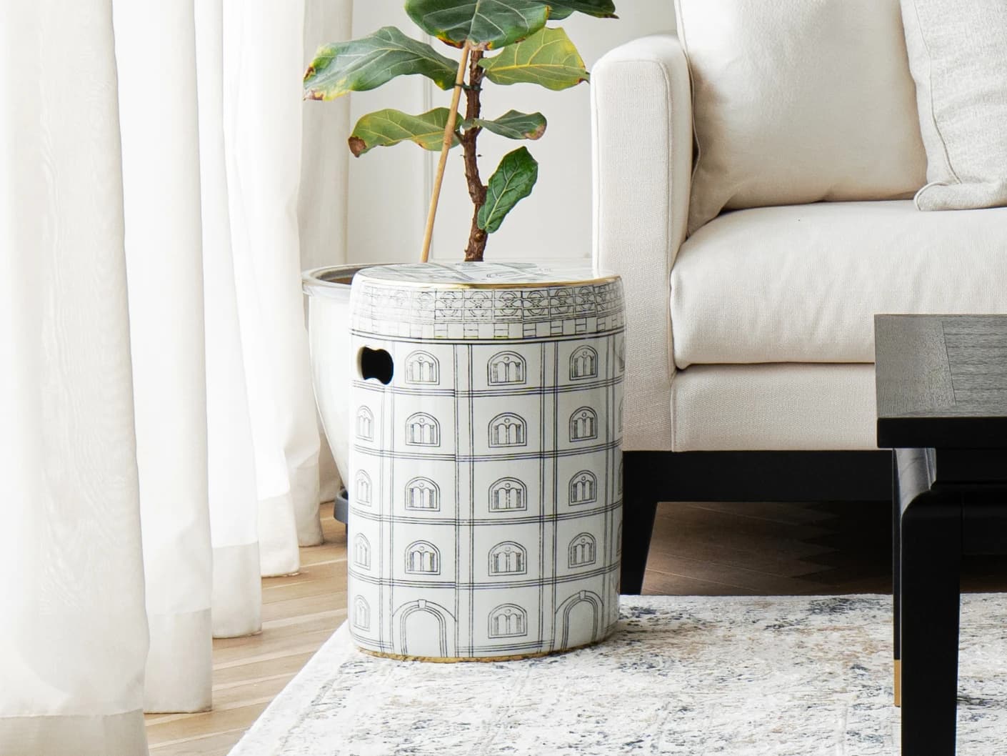 Mia Jacobsen II stools in black and white, shown in a lifestyle front view