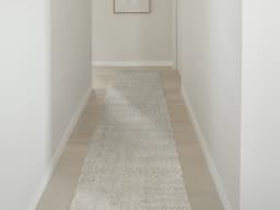 Miami Stone Runners carpet in brown and beige, shown in a lifestyle front view