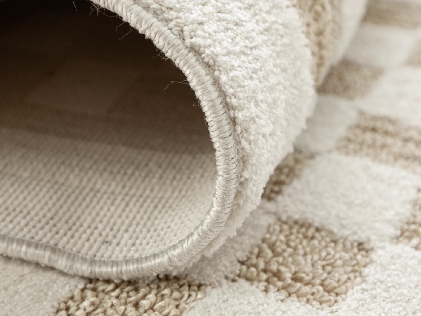 Milo Sandy carpets in beige, shown in a product close-up as image 2